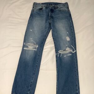 Men’s (or ladies) 501 Levi’s anniversary edition 90’s ripped jeans. NEVER WORN!